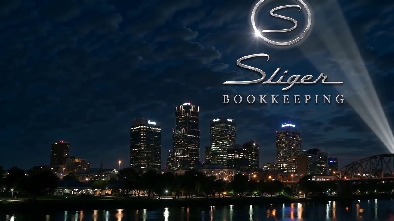 The Sliger Bookkeeping signal lit above the Little Rock skyline at night
